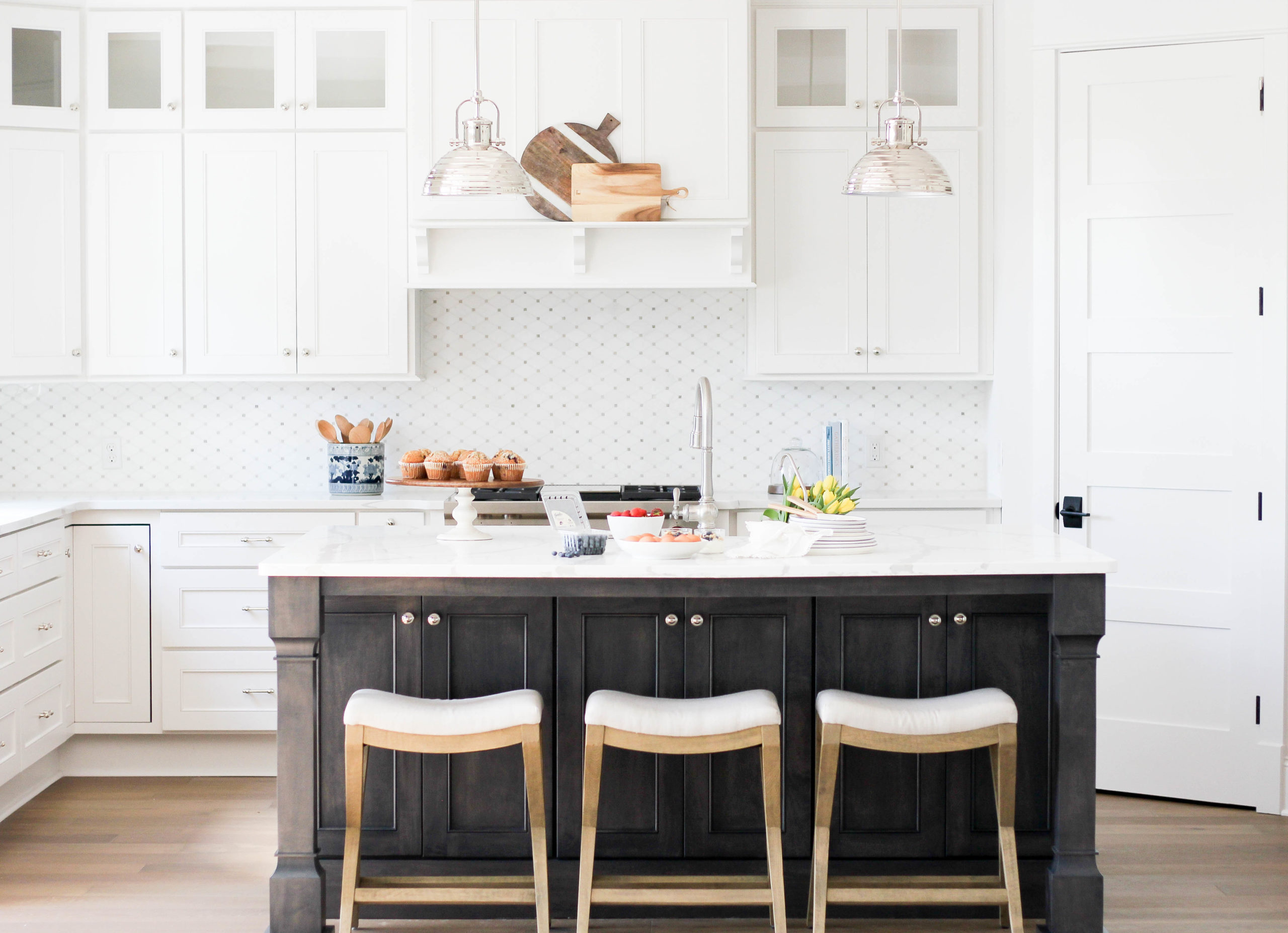 white kitchen with stained island