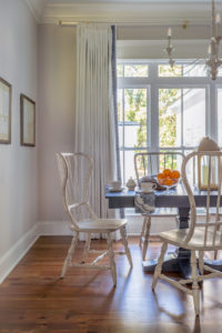 transitional dining room with lucite acrylic accents