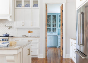 antique doors in white kitchen