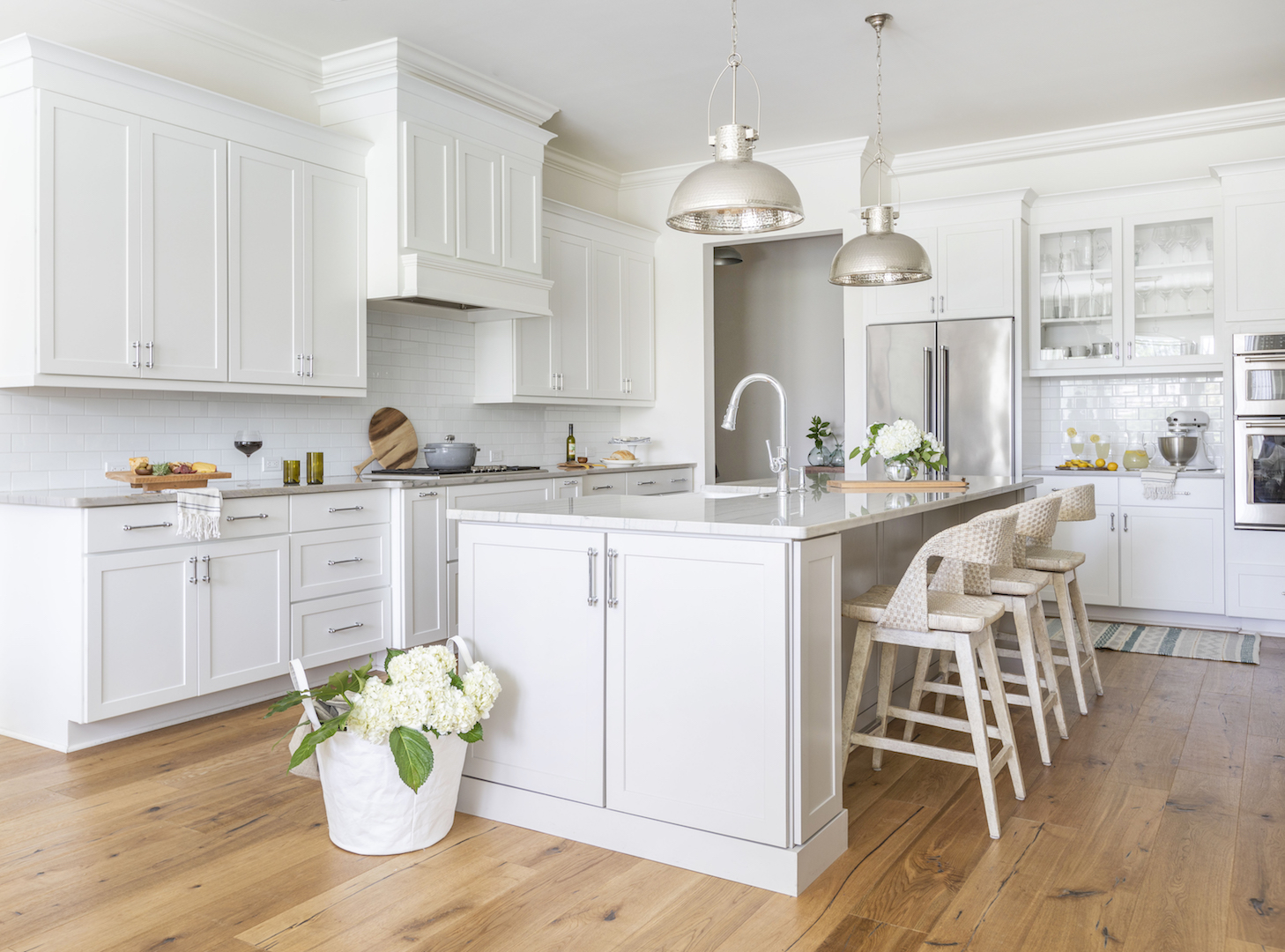 white shaker kitchen with polished nickel plumbing and hardware