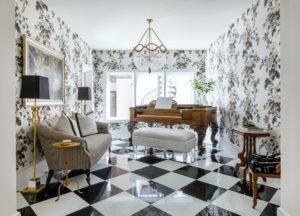 piano room with floral wallpaper